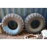 Two large tyres suitable as exercise equipment or exterior planters.