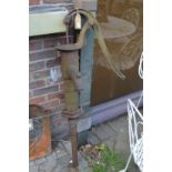 An old cast iron water pump.
