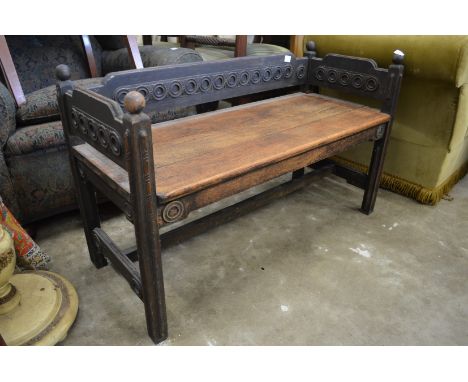 A small oak bench seat.