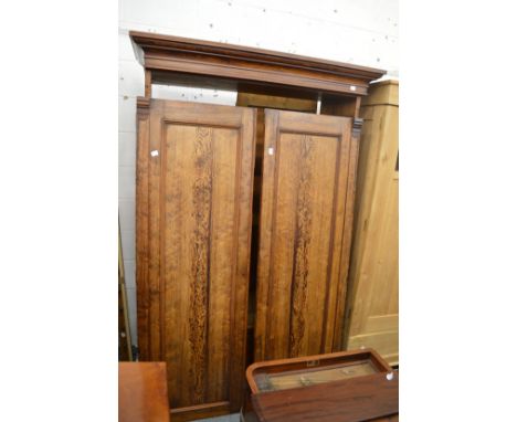 A Victorian pitch pine two door wardrobe.