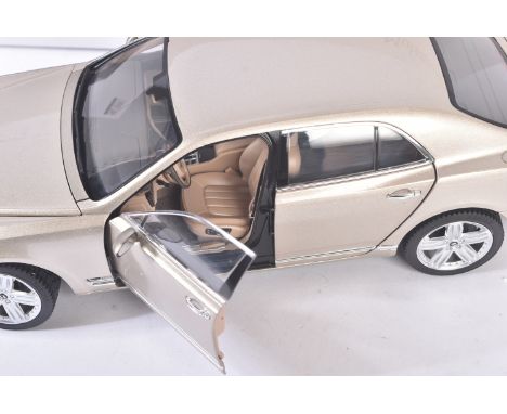 An original Rastar made 1/18 scale boxed diecast model No.43800 Bentley Mulsanne in metallic beige. Model appearing unused wi