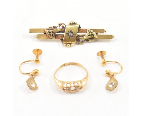 A group of antique gold jewellery. The lot to include a hallmarked 15ct gold and diamond bar brooch, a hallmarked 18ct gold a