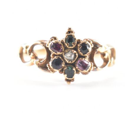 A Victorian yellow gold stone set regard cluster ring. The antique acrostic ring having a central rose cut diamond surrounded