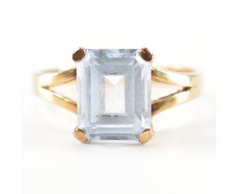 A vintage 18ct yellow gold &amp; blue stone dress ring. The ring having a&nbsp;large empress cut pale blue stone in claw moun