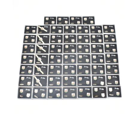 A collection of vintage Stratton Welsh enamelled cufflinks. Each pin having a square head with enamelled Welsh dragon to each