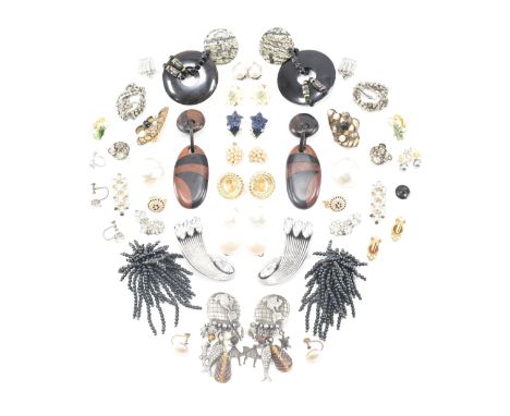 An assorted collection of costume jewellery clip on earrings. The lot to include; gold &amp; silver coloured metal, wood, sim