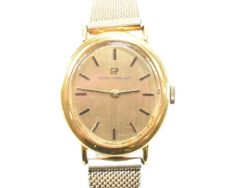 A Girard-Perregaux wrist watch. The watch having an oval face with a brushed gilt face with baton numerals to the chapter rin