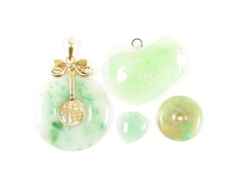 A group of four jade necklace pendants / charms. The lot to include a 14ct yellow gold &amp; jade pendant with box motif to b