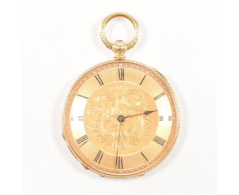A vintage 15ct gold pocket watch. The watch having a circular gold tone dial with Roman numeral indies, scrolling detailing t
