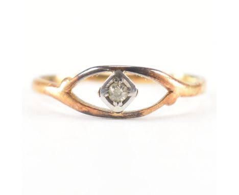 A vintage gold &amp; diamond single stone ring. The ring having a central round cut diamond in a diamond shape setting to a o