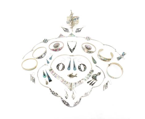 An assorted collection of abalone, shell &amp; mother of pearl set costume jewellery. The lot to include; silver tone metal, 