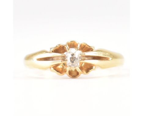 A vintage 18ct yellow gold &amp; diamond solitaire ring. The ring having an oval cut buttercup set diamond to tapering shank.