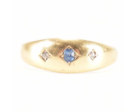 A 19th Century Victorian hallmarked 18ct gold, diamond and sapphire ring. The ring having a domed head set with a central rou