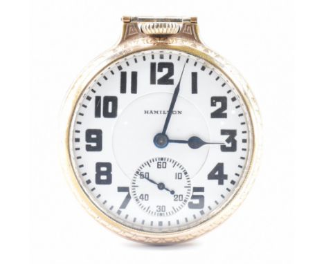 A 1930s Art Deco era gold plated open face pocket watch. The watch having an open face with white dial, arabic numerals to th