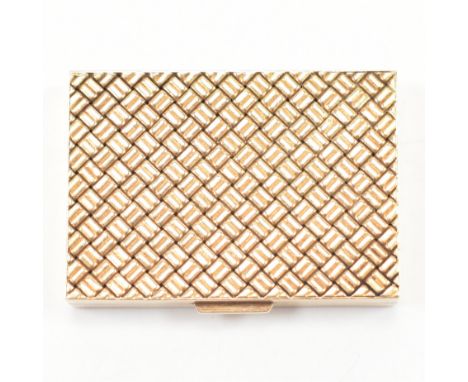 A vintage Van Cleef and Arpels 14ct gold pill box. The box having woven design panels to the top and bottom, with plain sides