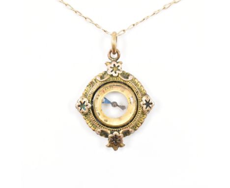 A 9ct gold flat link necklace chain with a yellow metal compass pendant. The pendant having a compass glass to the centre wit