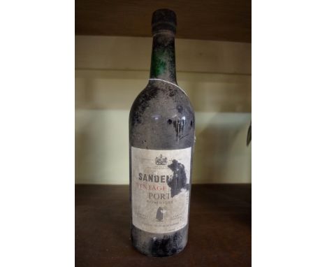 A bottle of Sandeman's 1966 vintage port, bottled in 1968. Condition Report: Provenance: From the estate of the late actor Ge