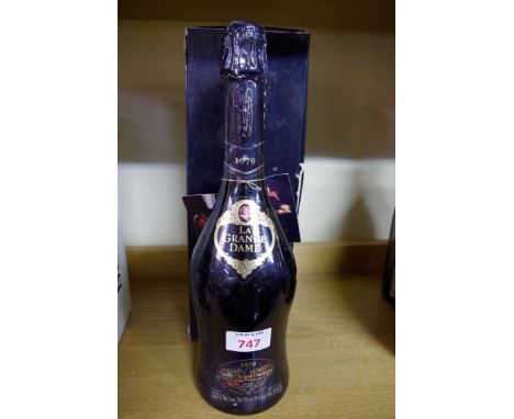 A bottle of Veuve Clicquot La Grande Dame, 1979 vintage champagne, in original carton.
