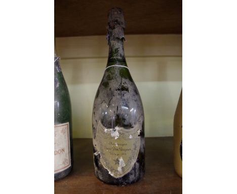 A 75cl bottle of Dom Perignon 1978 vintage champagne.  Condition Report: Provenance: From the estate of the late actor Geoff 
