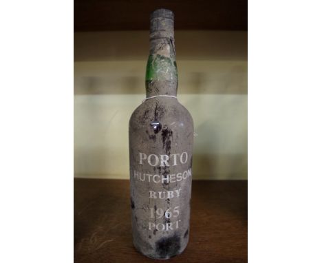 A bottle of Hutcheson 1965 vintage ruby port.  Condition Report: Provenance: From the estate of the late actor Geoff Hughes. 