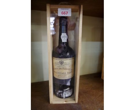 A 75cl bottle of Fonseca Quinta do Panascal 1986 vintage port, in pine box.