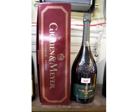 A 150cl magnum bottle of Gratian & Meyer Cuvee Flamme sparkling wine, in card box. 