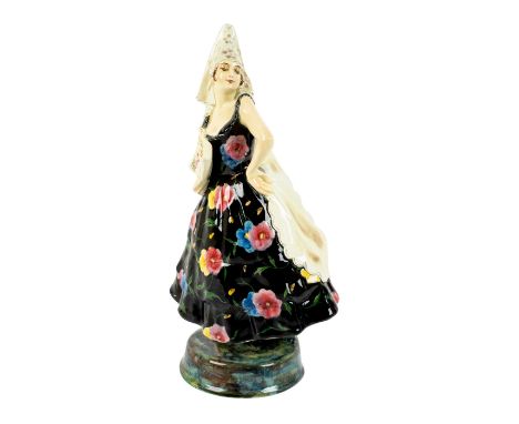 Figure of a Spanish dancer with a fan. Goldscheider Made in Austria backstamp.Artist: Josef LorenzlIssued: c. 1920Dimensions: