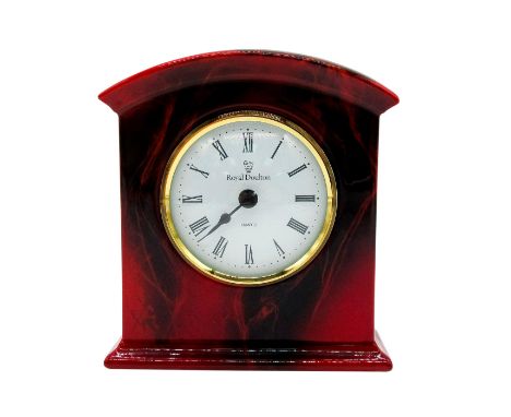 High fired flambe glaze with black swirls. Quartz clock with gold color rim.Royal Doulton and Quartz on the clock's face. Roy