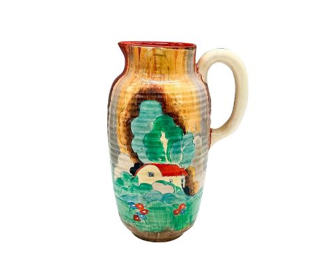 A hand painted Art Deco ribbed pitcher. Depicting an colorful abstract landscape. Clarice Cliff for Newport Pottery backstamp