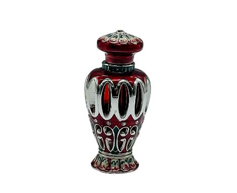 Includes liquid perfume. A stunning silver tone metal bottle in a shimmery burgundy glaze; adorned with enamel flowers and de
