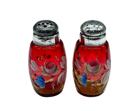 A set of red to yellow ombre salt and pepper shakers adorned with hand painted enamel flowers. Topped with silver plated stop