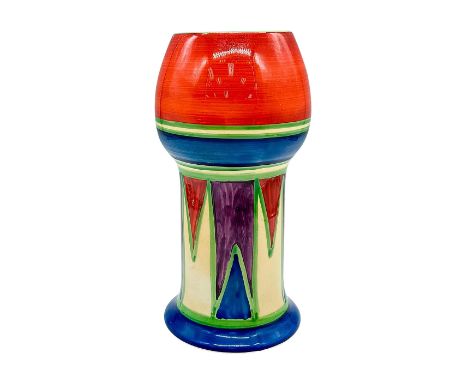 A hand painted Art Deco ceramic vase decorated in an abstract geometric design in a colorful palette. Clarice Cliff for Newpo