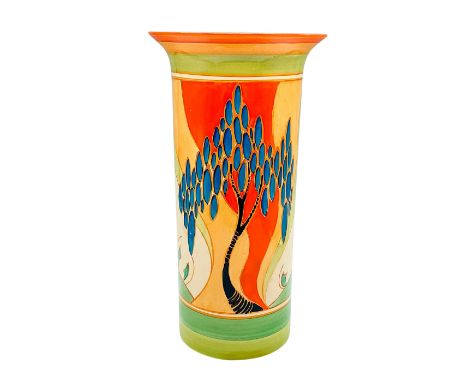 A beautiful hand painted cylindrical Art Deco vase decorated in an abstract geometric flowers in a colorful palette. Clarice 