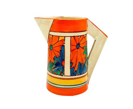 A hand painted Art Deco ceramic pitcher decorated with geometric abstract flowers. Clarice Cliff for Wilkinson backstamp. Art