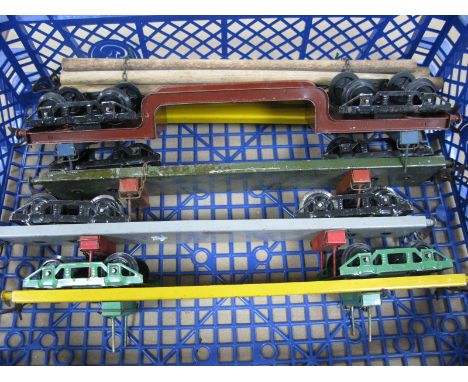 Four Hornby 'O' Gauge/7mm No.2 Unboxed Pre-War Lumber Wagons, (one with lumber load). Plus a No. 2 Trolley Wagon, fair to ver