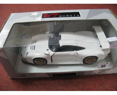 A UT Models 1:18th Scale Diecast Model Porsche 911 GT1, white paint work boxed, but damage to sellophane.