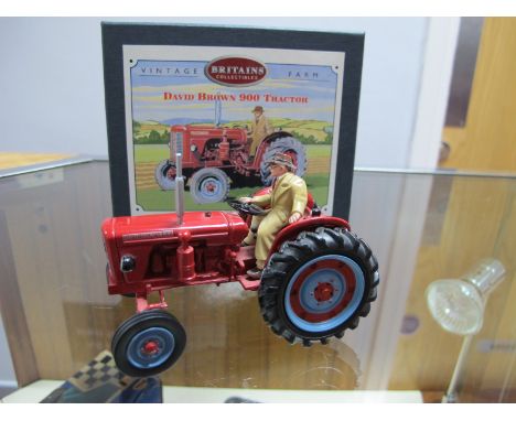 A Britains Collectables Diecast Model David Brown 900 Tractor, (red), #08716, wooden display plinth, literature, damage to fa