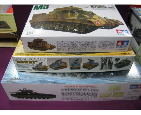 Three Plastic Model Military Tank Kits, all 1:35th scale, comprising of Hobby Boss  #83842 Soviet T-35 heavy tank - before 19