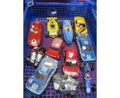 Eleven 1960's and Later Racing Slot Cars, by Scalextric and others, all playworn.