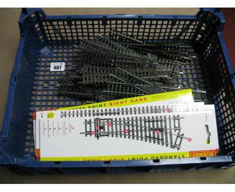 Approximately Twenty Seven 'OO' Gauge/4mm Peco, Hornby, etc points, slips, crossovers - unboxed fair to very good. Plus seven