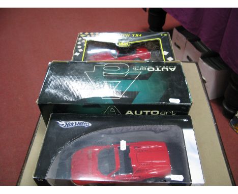 Three 1:18th Scale Diecast Model Cars, by Autoart, Hotwheels, Jadi including Hotwheels Ferrari Dino 246 GTS, Autoart Aston Ma