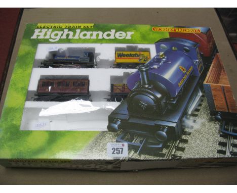 A Hornby "OO"Gauge/4mm Ref R701 "Highlander" Boxed Train Set, comprising 0-4-0 "Pug" steam locomotive,H.R blue "Loch Ness R/N