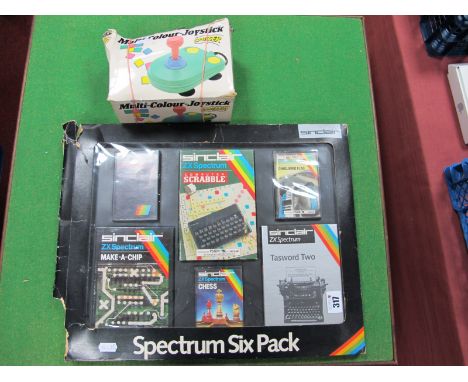 A Spectrum Six Pack Games Set, including 'Chequered Flag' and 'Chess', boxed, plus a multi-colour joystick.