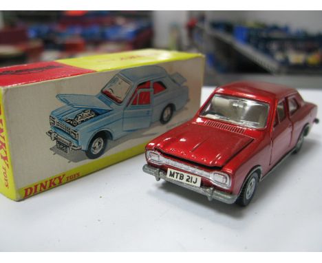 A Dinky Toys NO. 168 - Ford Escort, in metallic red, very good, boxed.