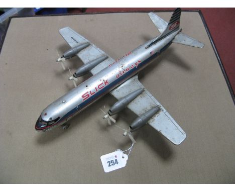 A 1960's Battery Operated Tinplate Aircraft, by Marx, although Made In Japan, sign written - 'Slick Airways; playworn, 37cm l