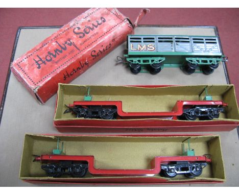 Three Hornby 'O' Gauge/7mm Pre War No. 2 Items of Boxed Rolling Stock, L.M.S Cattle Truck and two R5684 Trolley Wagons, all v