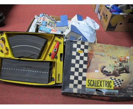 A Quantity of 1960's Scalextric, including a GP33 Set, with a Lotus and Ferrari, boxed. Made up pit buildings, lights, track 