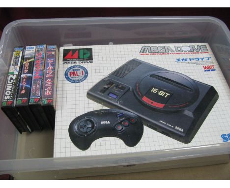 A Sega Mega Drive 16 Bit Gaming Console, including control pad original box; together with four gaming cartridges Bonanza Bro