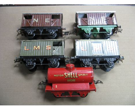 Five Hornby 'O' Gauge/7mm Pre-War Unboxed Items of Rolling Stock, two N.E Brake/Goods Vans, LMS Brake/Goods and a Shell Tank 