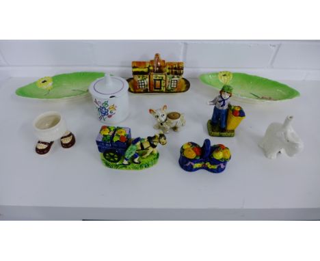 Various novelty condiments to include three Japanese sets, Cottage Ware set, Carlton ware dishes and an egg cup, pie funnel a